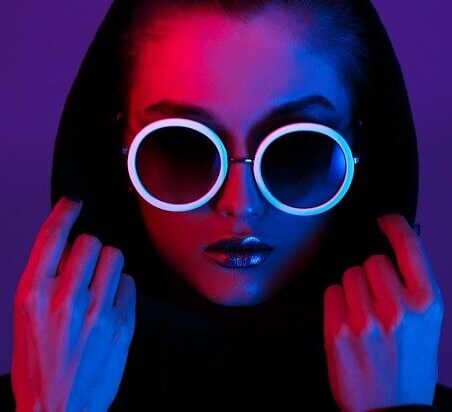 Woman with sunglasses and a hood